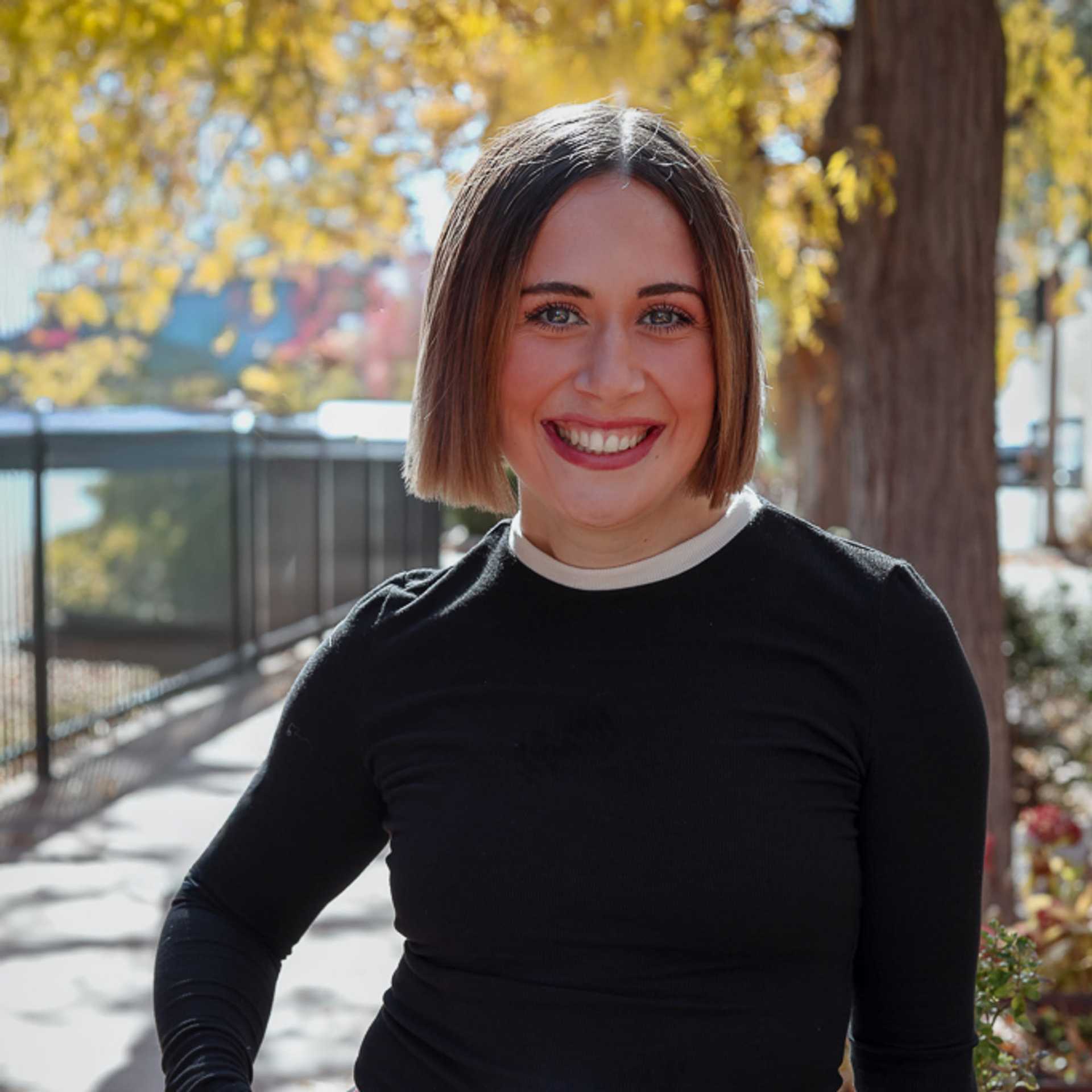 Portrait of Elena, a professional stylist at Posh Salon And Boutique, showcasing their expertise and style.