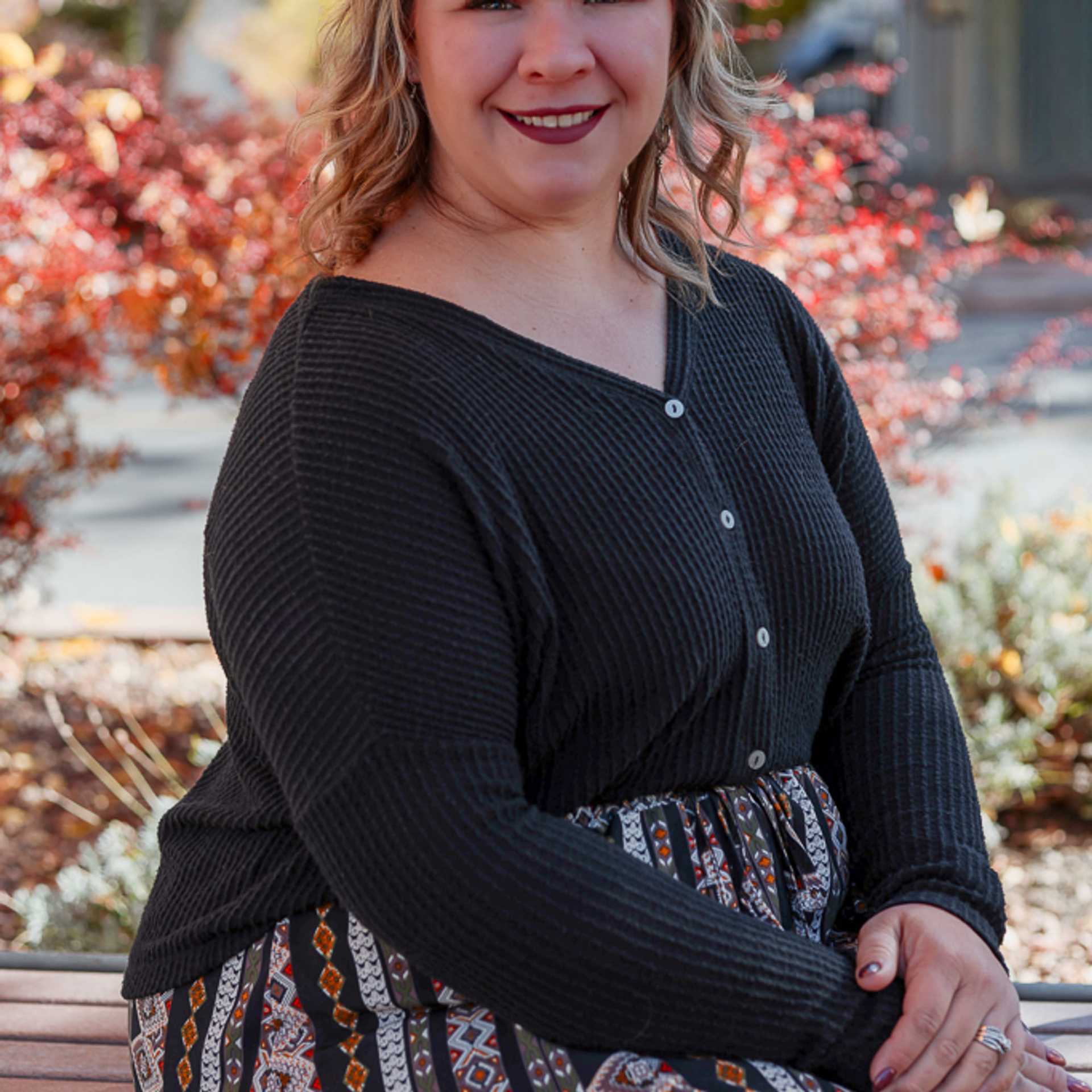 Portrait of Courtney, a professional stylist at Posh Salon And Boutique, showcasing their expertise and style.