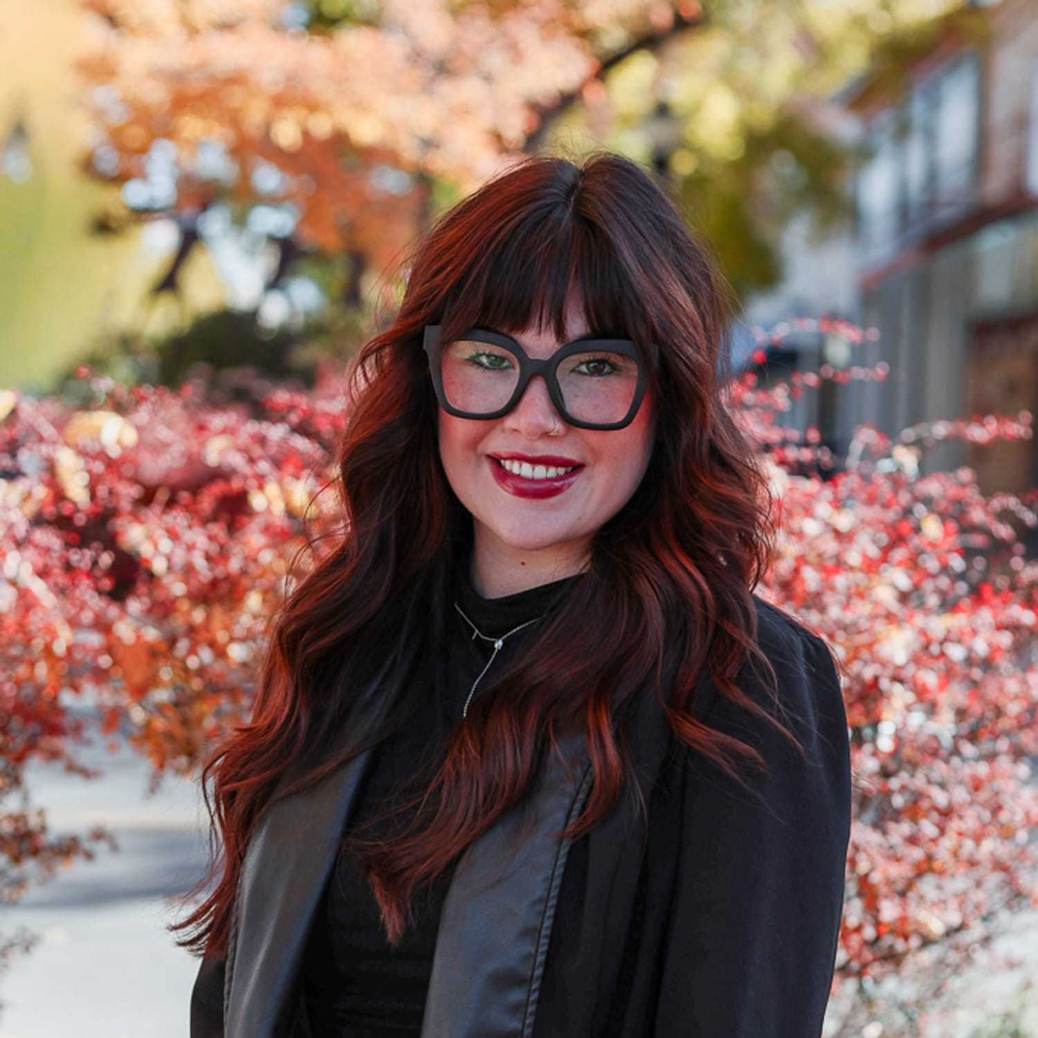 Portrait of Alexus, a professional stylist at Posh Salon And Boutique, showcasing their expertise and style.