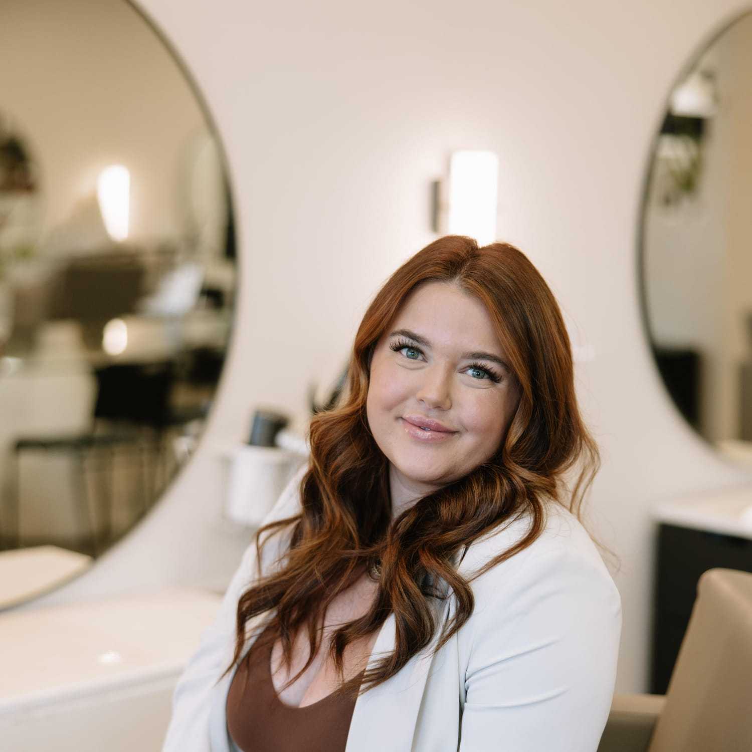 Portrait of Breyanna, a professional stylist at Posh Salon And Boutique, showcasing their expertise and style.