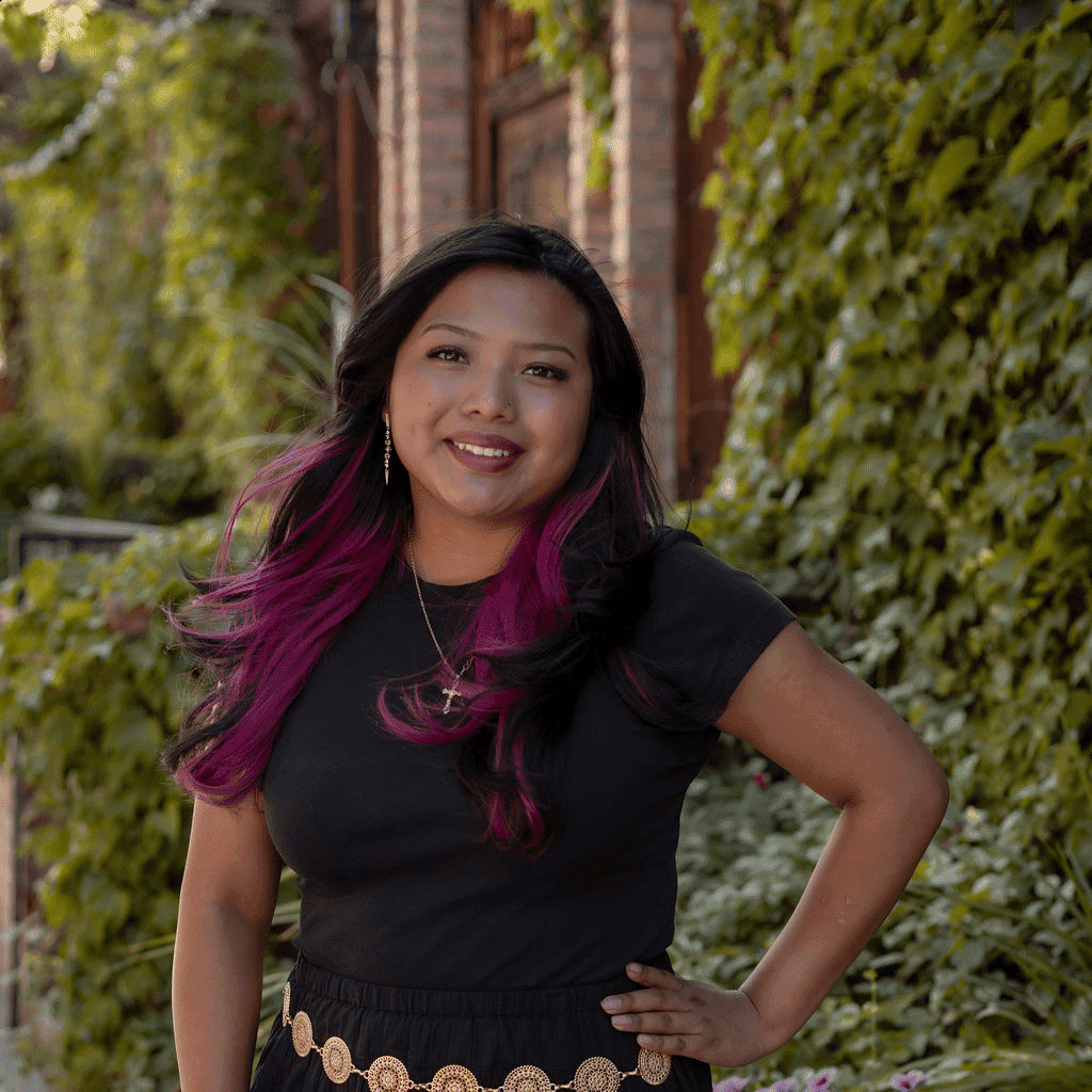 Portrait of Meztli, a professional stylist at Posh Salon And Boutique, showcasing their expertise and style.