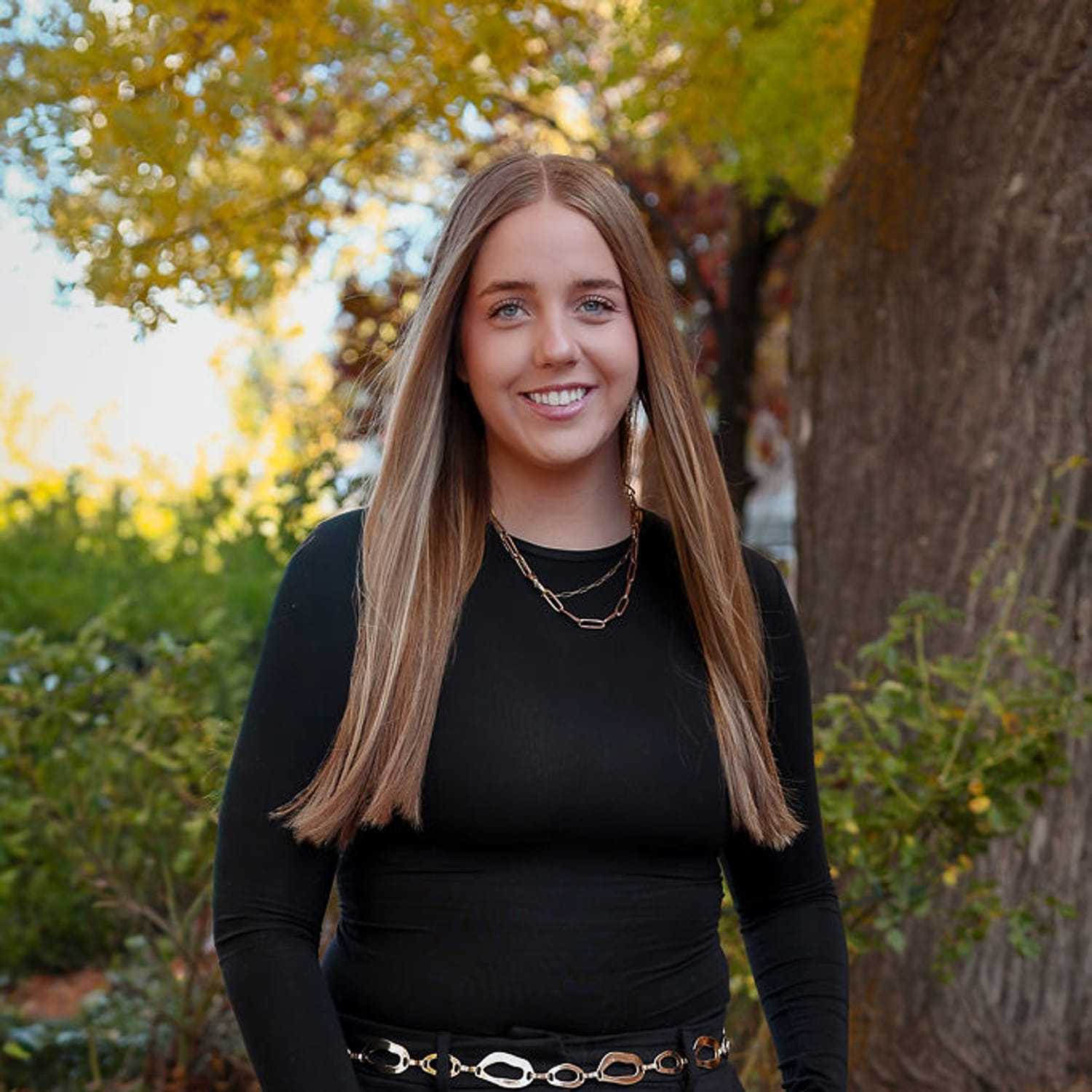 Portrait of Emma, a professional stylist at Posh Salon And Boutique, showcasing their expertise and style.