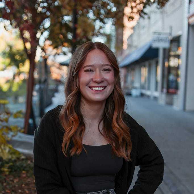 Portrait of Aly, a professional stylist at Posh Salon And Boutique, showcasing their expertise and style.