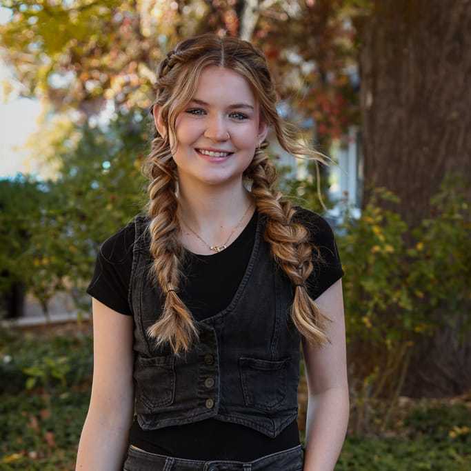 Portrait of Cameron, a professional stylist at Posh Salon And Boutique, showcasing their expertise and style.