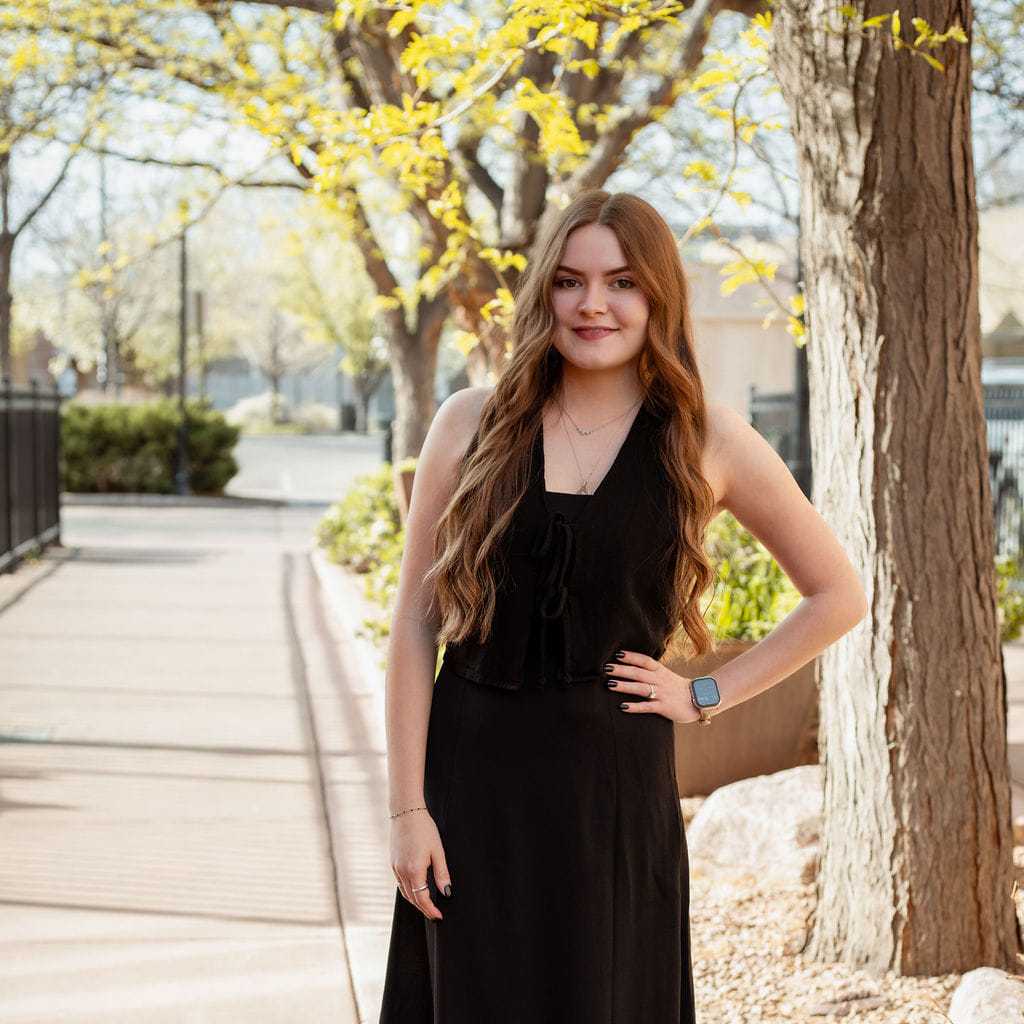 Portrait of Justice, a professional stylist at Posh Salon And Boutique, showcasing their expertise and style.