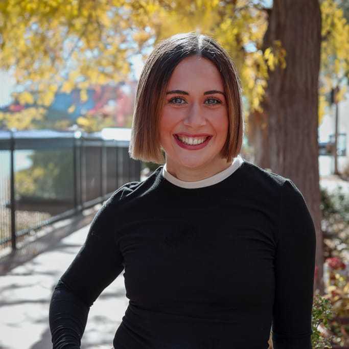 Portrait of Elena, a professional stylist at Posh Salon And Boutique, showcasing their expertise and style.